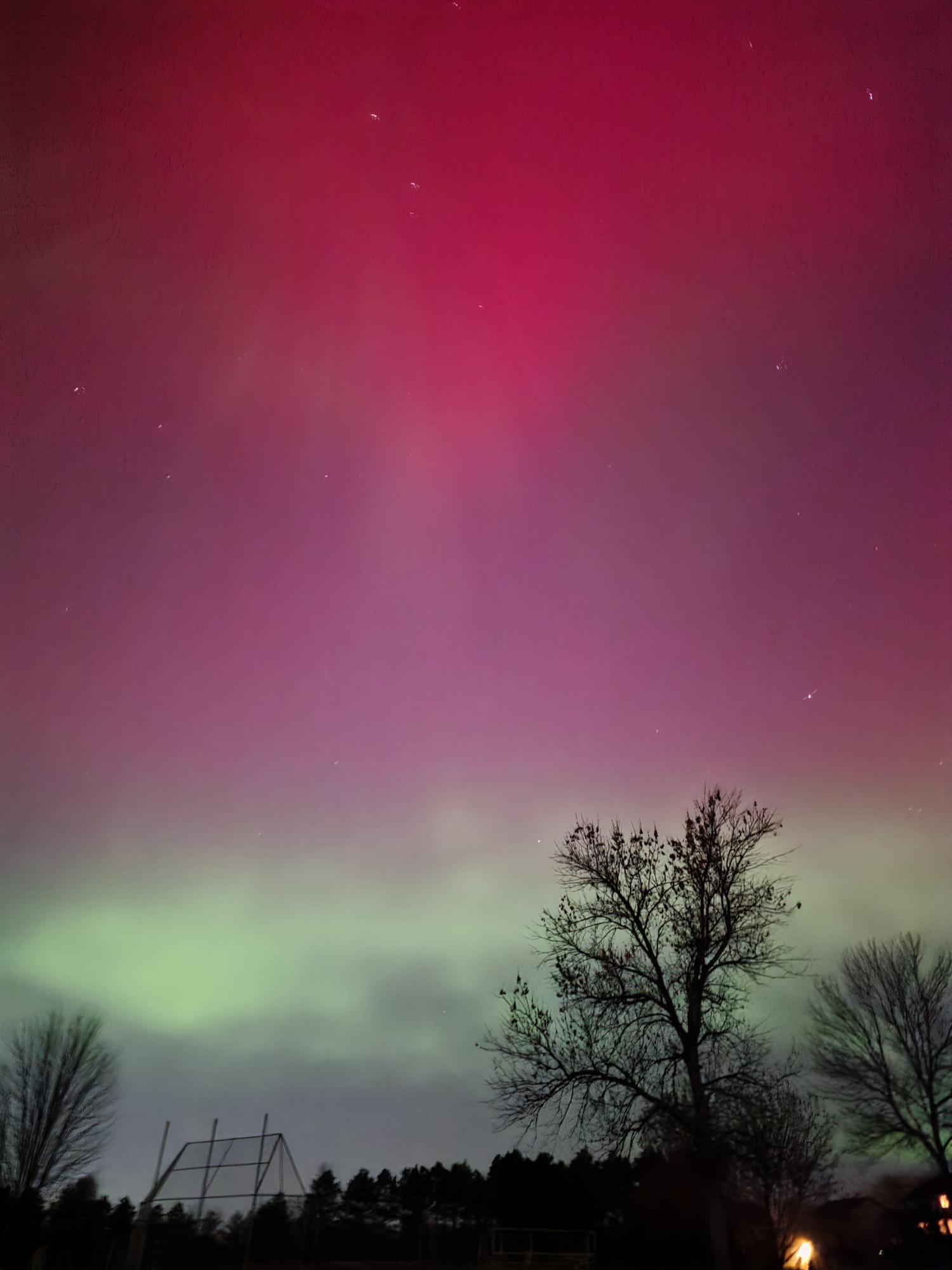 Northern lights over a quiet landscape — the wonder of nature that inspires my work